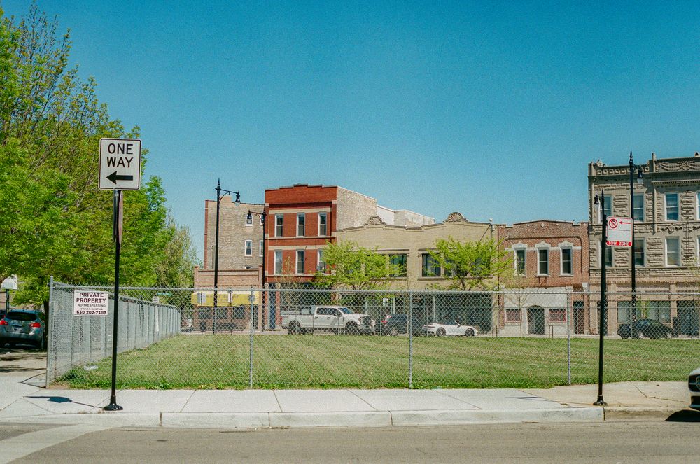 Fenced corner plot with road on two sides